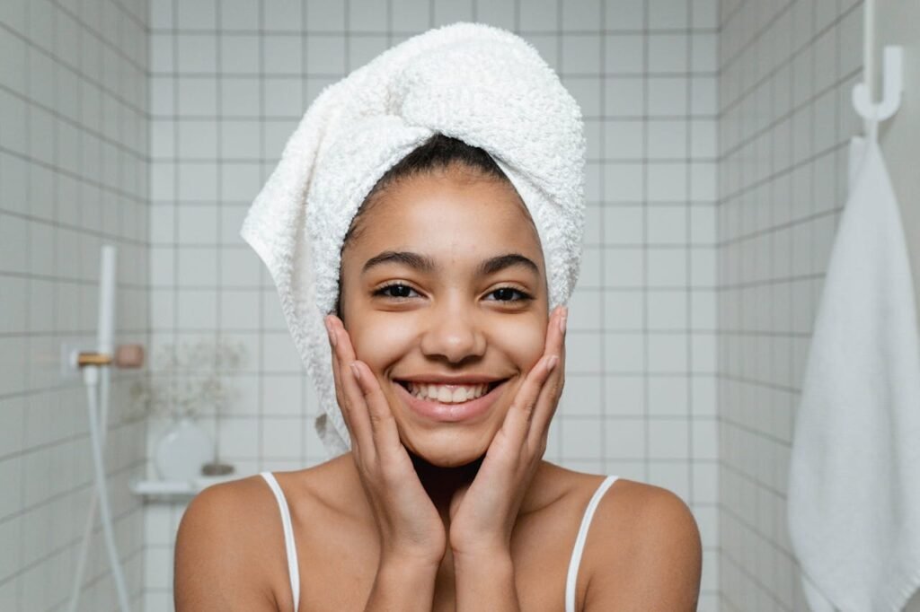 A happy smiling girl in a bathroom