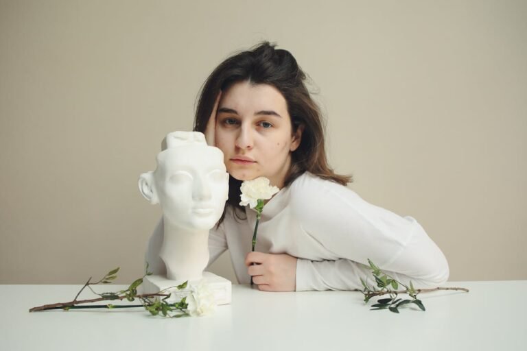 Woman touching glowing clear skin after holistic hormonal acne healing